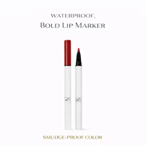 Tina Mattern Waterproof Bold Lip Marker hero image showing two white lip markers with red caps and one exposed felt-tip applicator on white background