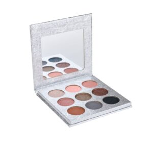 Tina Mattern Sassy Eyeshadow Palette with 9 bold shades, including matte and shimmer finishes, in sleek silver packaging with a built-in mirror.