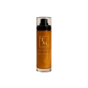 Tina Mattern Illuminating Body Oil in a sleek pump bottle, featuring a shimmering gold formula that hydrates and enhances skin radiance.