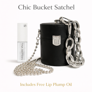 Tina Mattern Chic Bucket Satchel with silver chain strap and free Lip Plump Oil on a white background